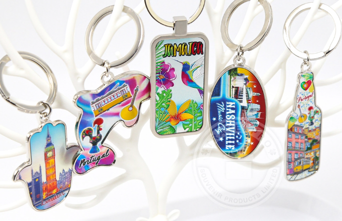 Colorful international souvenir keychains from various destinations