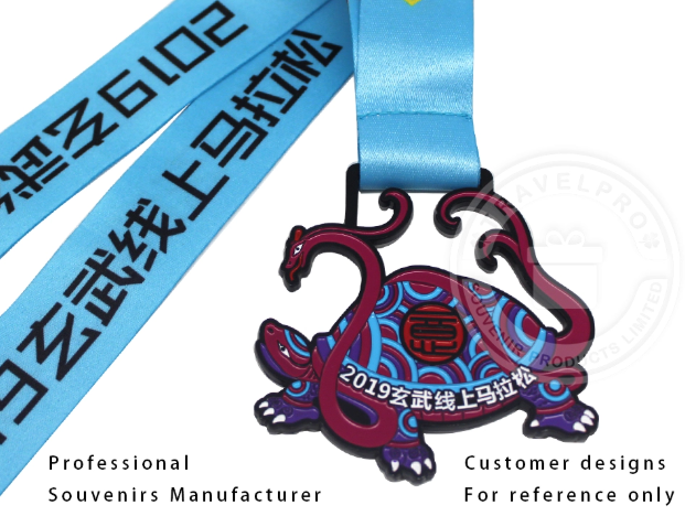 Colorful turtle-shaped marathon medal souvenir with blue ribbon